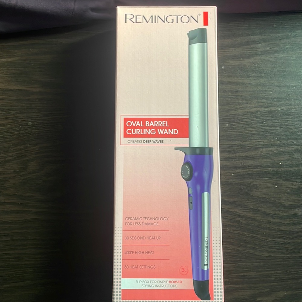 Oval barrel curling wand